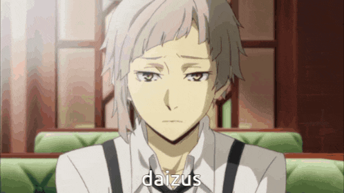 a white haired anime character with the name daizus written on his face