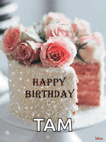 a birthday cake with pink roses and the name tam written on it