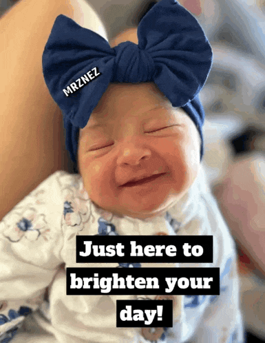 a baby wearing a blue headband with the name mrznez written on it