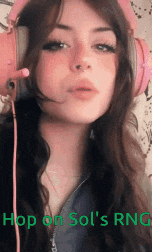 a girl wearing pink headphones with the words hop on sol 's rng written below her