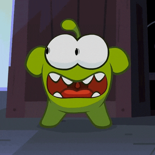 a green cartoon character with a red mouth and teeth