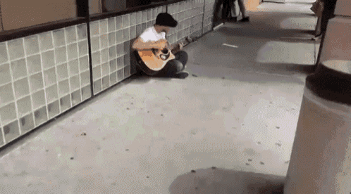 A Man Was Going Grocery Shopping When He Saw A Guy Playing An Amazing Tune On His Guitar. GIF - Guy Guitar Acoustic GIFs