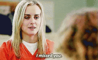 a woman in an orange shirt says i missed you .