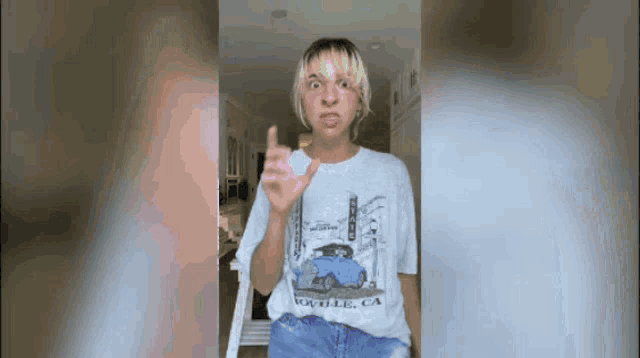 a woman wearing a t-shirt that says ' google , ca ' on it
