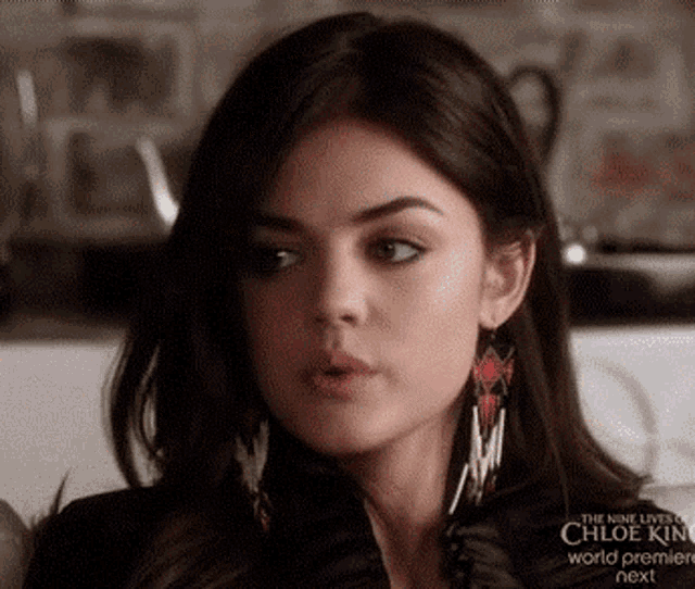 a close up of a woman 's face with the word chloe on the bottom