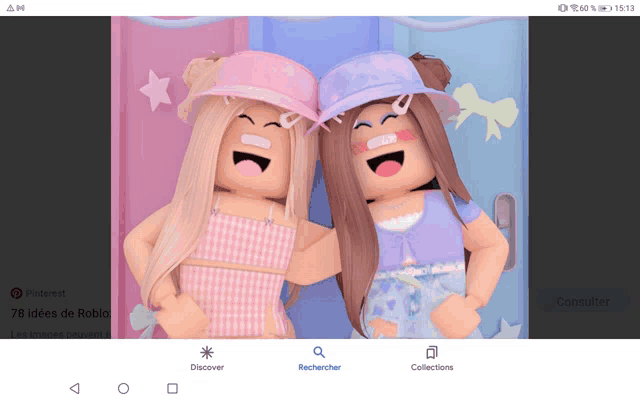 a screenshot of a picture of two dolls with the search bar at the top
