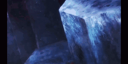a large block of ice is floating in the air
