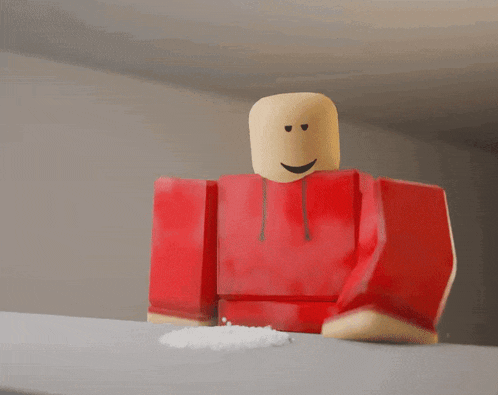 a red roblox character is standing in a room with snow falling around him