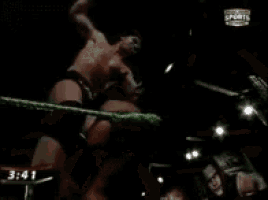 a man in a boxing ring with the time 3:37 on the bottom