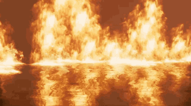 a painting of a fire with a reflection of the fire in the water