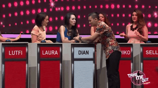a group of people are playing a game called " take me out "