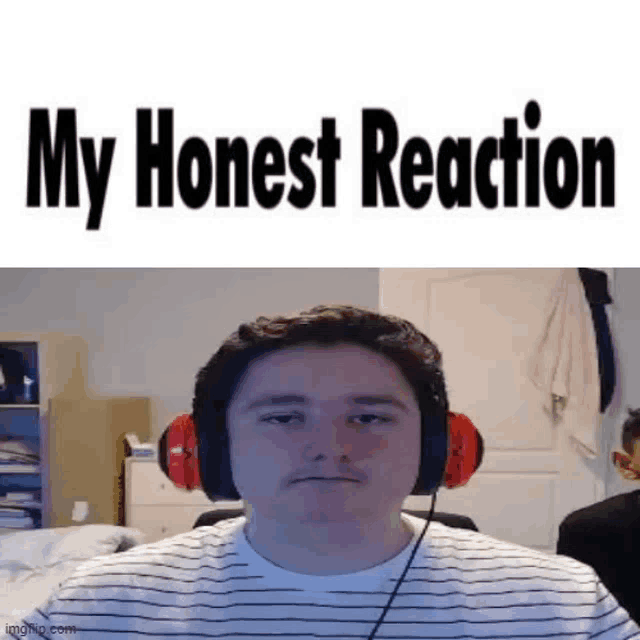 a young man wearing headphones is making a funny face .