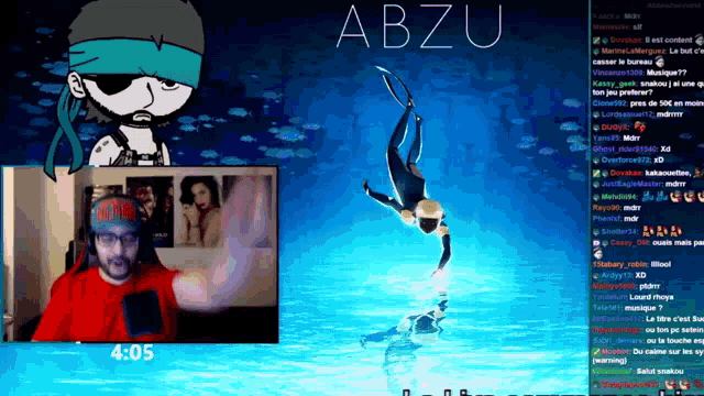a man in a red shirt stands in front of a screen that says abzu on it