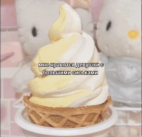 a slice of cake with a pink heart on top