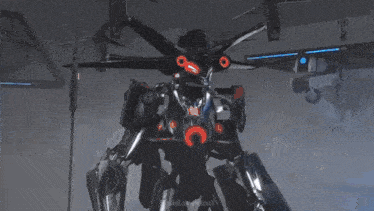 a black robot with blue lights is displayed on a gray background