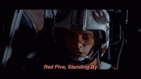 a man wearing a helmet and goggles says " red five standing by "