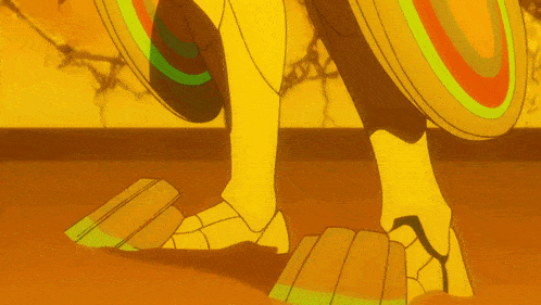 a cartoon drawing of a yellow object with a green circle on it