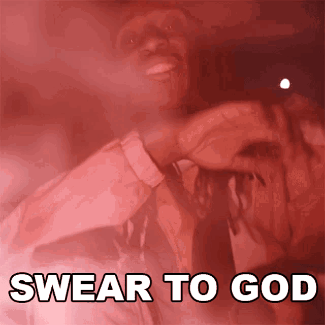 a man in a suit and tie with the words swear to god on the bottom