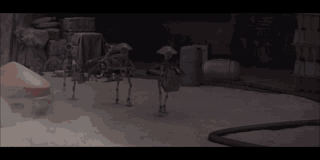 a group of robots are standing in a room with smoke coming out of it