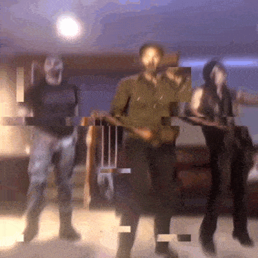 a group of people dancing in a room with a glitch effect