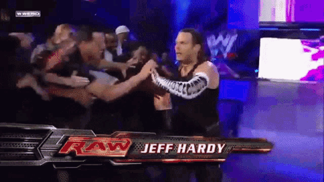 a wrestler named jeff hardy is being surrounded by fans