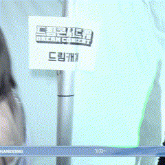 a woman stands in front of a sign that says stream concert