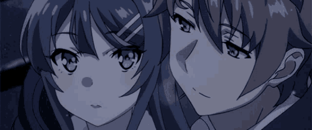 a boy and a girl are standing next to each other
