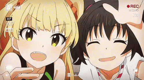 two anime girls are taking a selfie with a recorder that says rec
