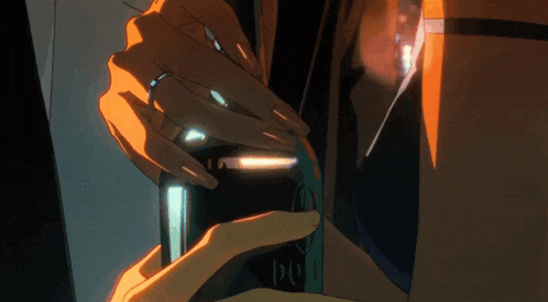 a close up of a person 's hand with a ring on