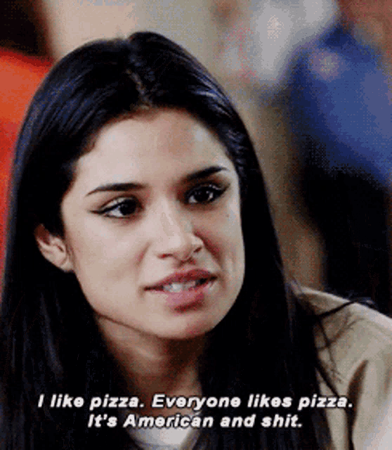 a close up of a woman 's face with the words " i like pizza everyone likes pizza it 's american and shit "