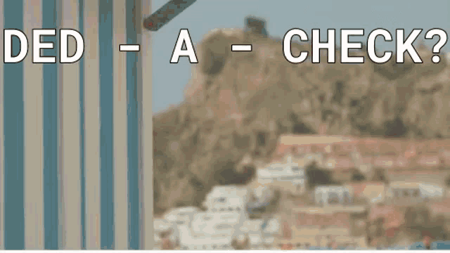 a blurred image of a city with the words ded a check written on it .