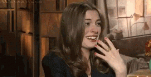 Anne Hathaway Laughing GIF - Anne Hathaway Laughing GIFs