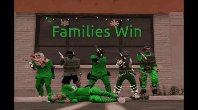 a group of people in green standing in front of a sign that says " families win "