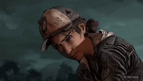a person wearing a baseball cap with the letter d on it looks down