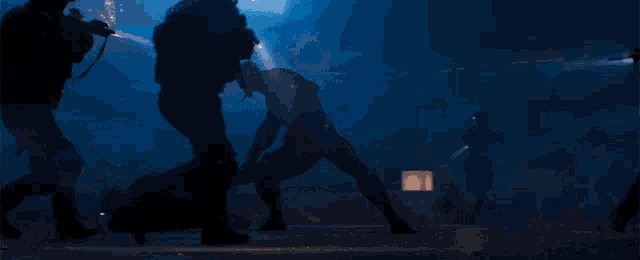 a man is being attacked by a group of men