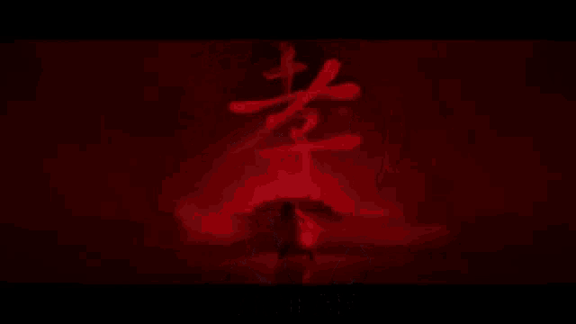 a woman is standing in front of a red background with the words `` who am i without my armour ? ''