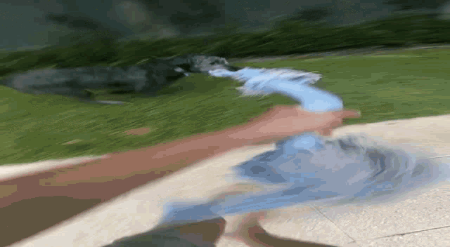 a blurry picture of a person holding a blue cloth