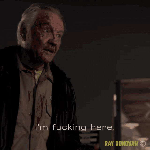 a man with blood on his face says " i 'm fucking here " in a ray donovan show