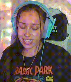 a woman wearing headphones and a t-shirt that says rassic park