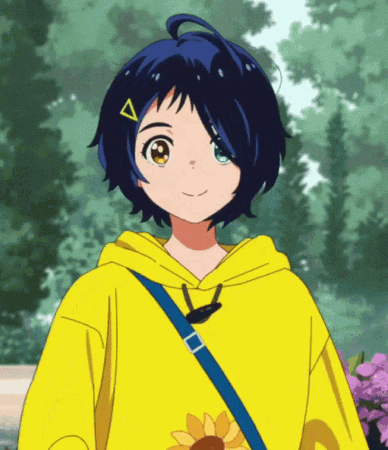a girl with blue hair wearing a yellow hoodie and a blue strap