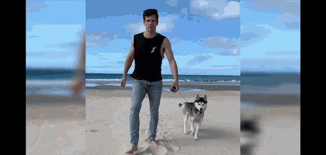 a man is walking a husky dog on a leash on a beach