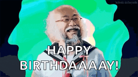 a man with glasses and a beard says happy birthday !