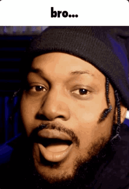 a man wearing a beanie has his mouth open and the word bro is on the bottom