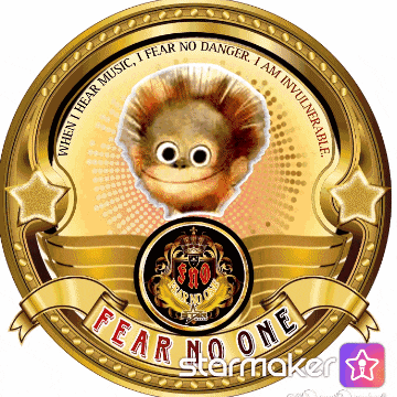 a gold circle with a monkey on it that says fear no one