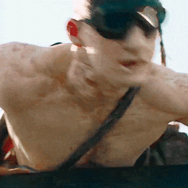 a man without a shirt is wearing sunglasses and a bandage on his face