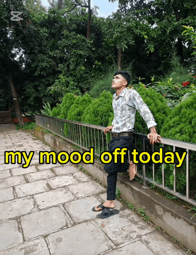 a man leaning on a railing with the words my mood off today