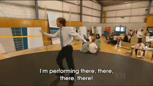 a man is standing on a trampoline with the words i 'm performing there there there