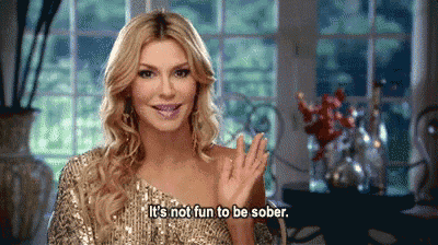 a woman in a sequined dress says it 's not fun to be sober .