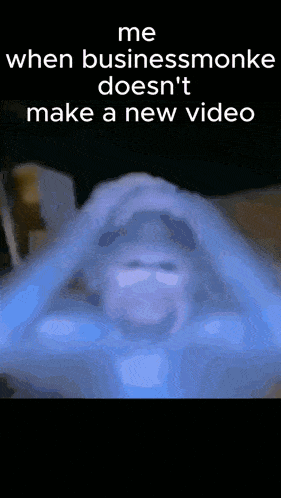 a blurry picture of a person with the words me when business monks does n't make a new video