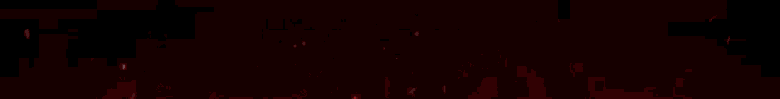 a red light is shining on a black background and the letter b is visible .